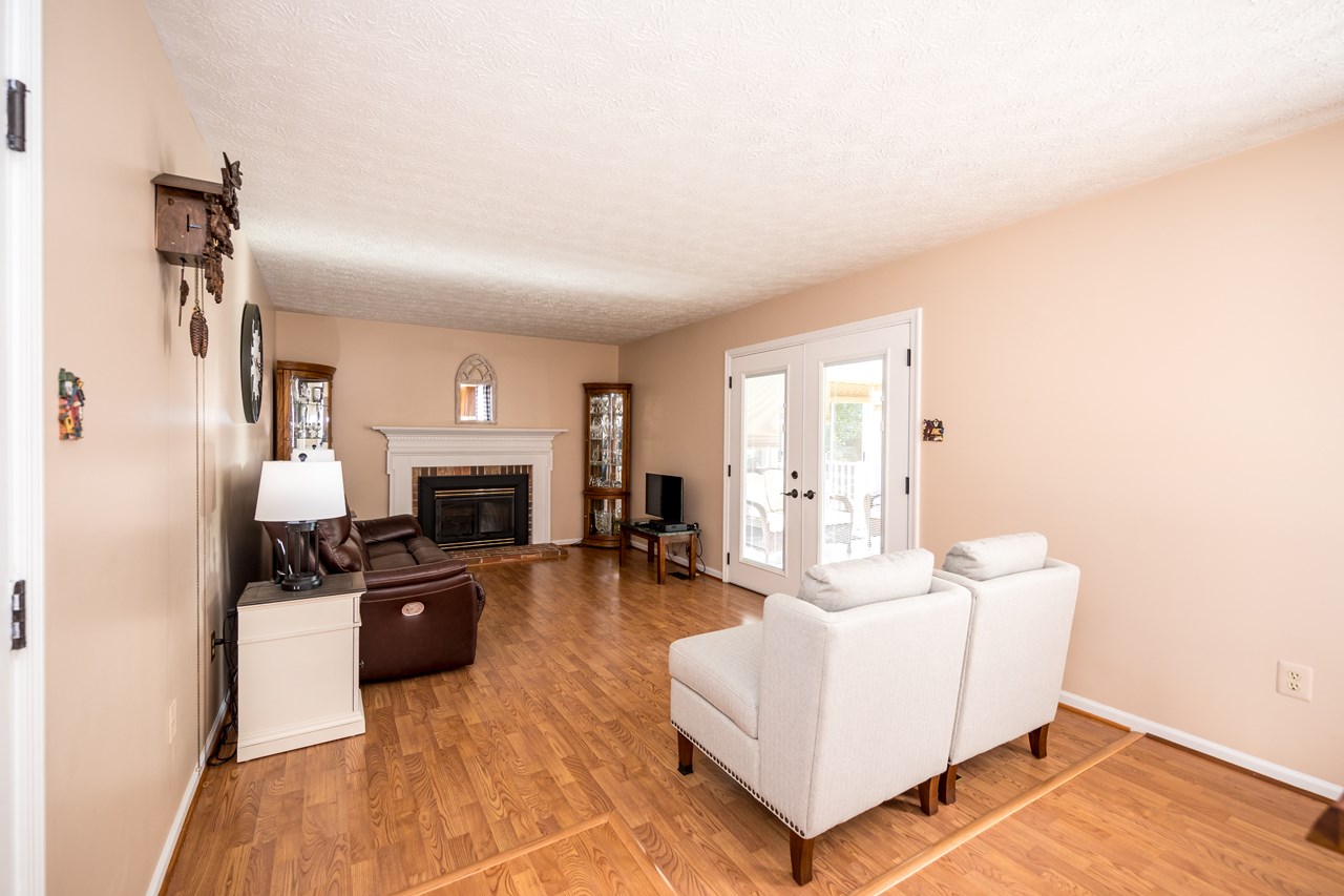 family room withfireplace & sunroom access